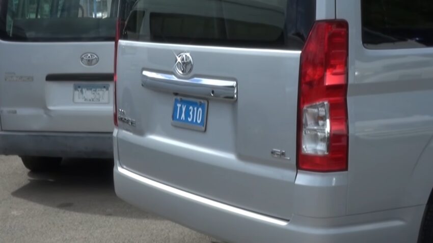 A St. Lucia taxi van shows a blue TX license plate