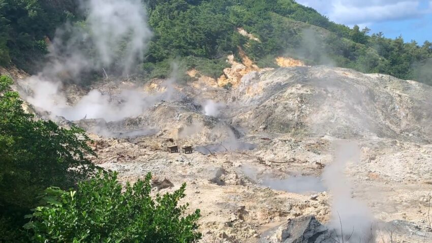 Steam rises over the geothermal pools at Sulphur Springs in St. Lucia